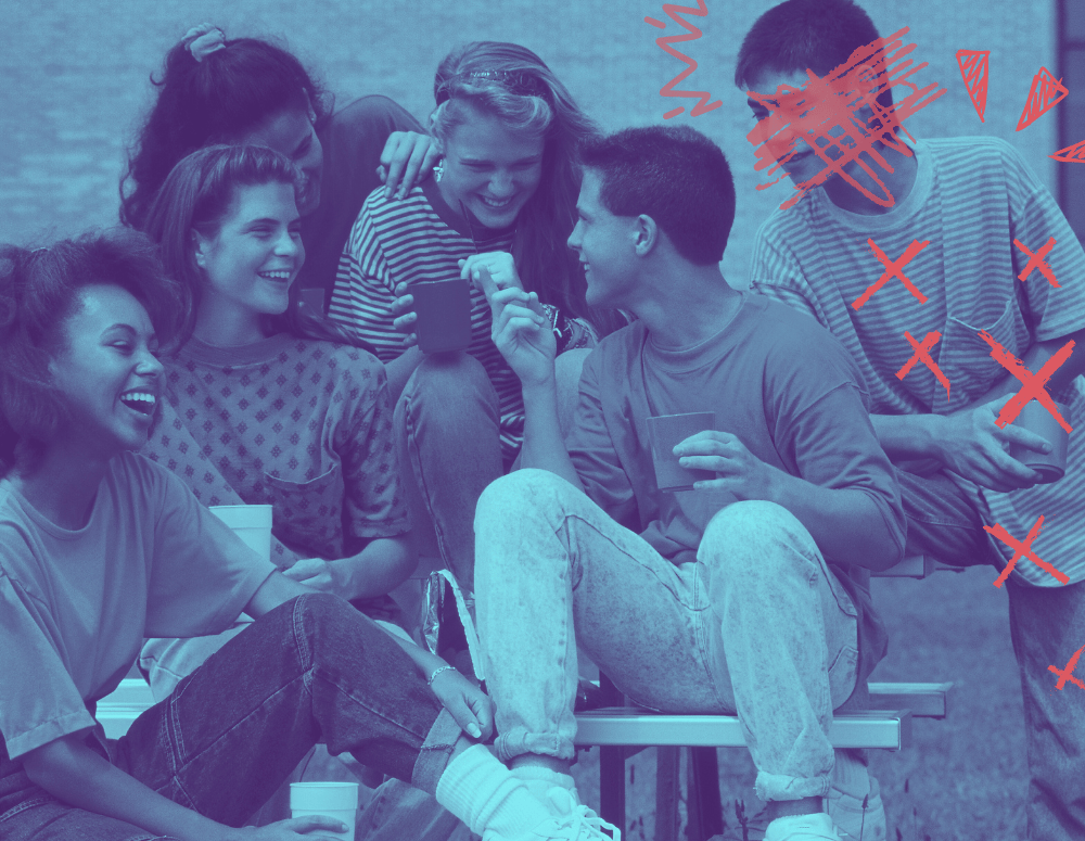 Group of teens talking and laughing. One teen is left out and has red scribbles on his face and body.